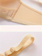 Women's soft supportive wire-free bra with adjustable back closure for lift and shaping featuring a smooth finish